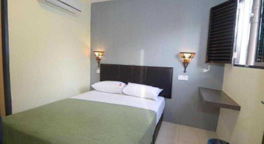 Kuok Pin Hotel Кучинг Экстерьер фото