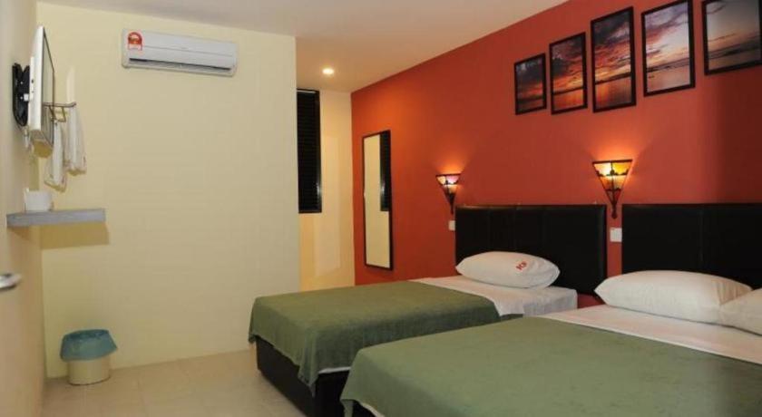 Kuok Pin Hotel Кучинг Экстерьер фото